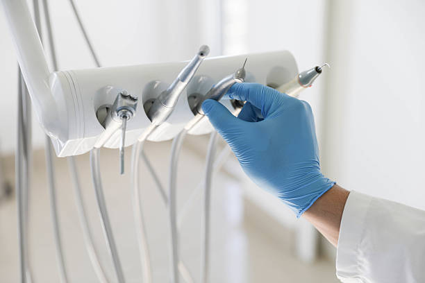 Professional Root Canal Treatment technician working in Hanna City, IL
